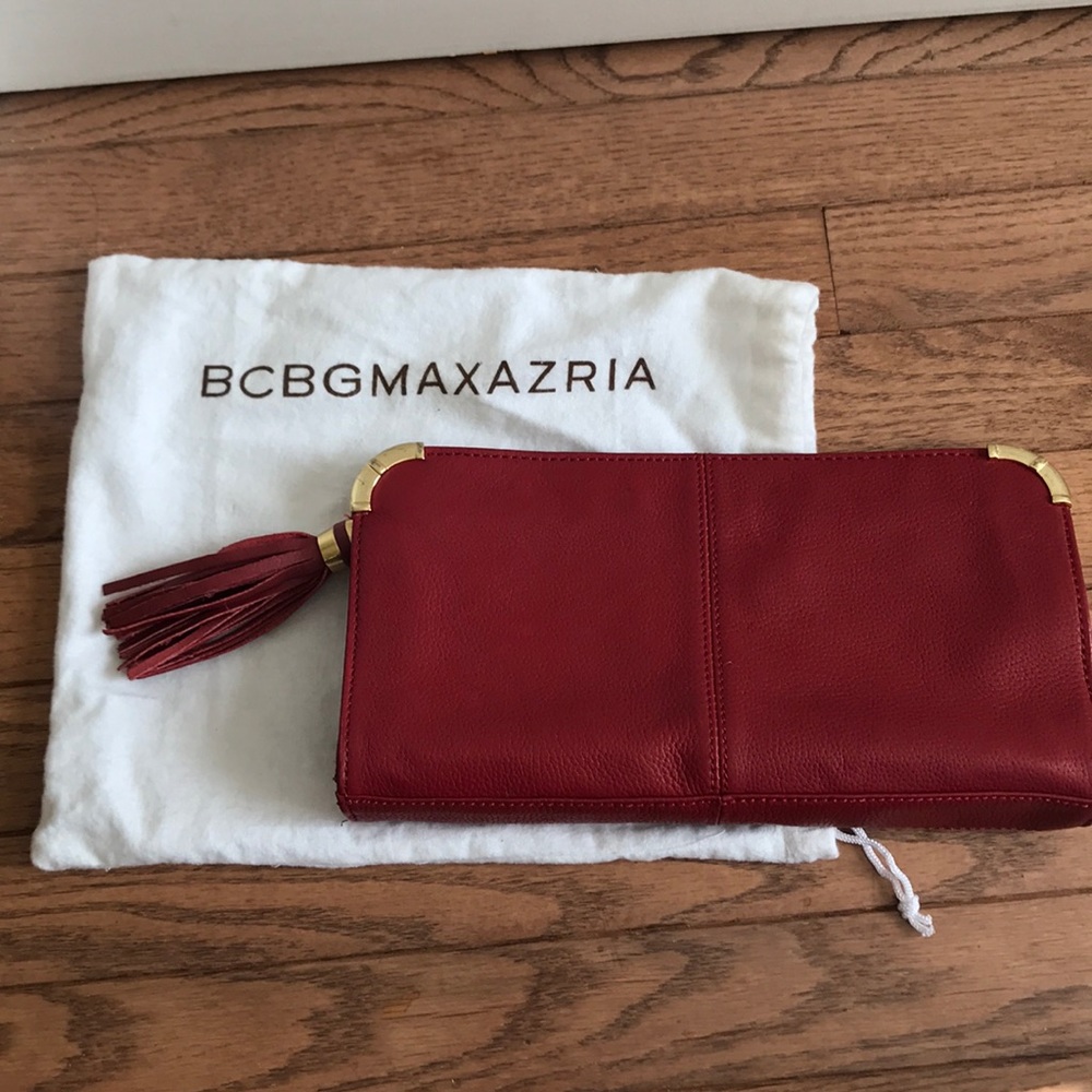 Bcbgmaxazria clutch with tassel